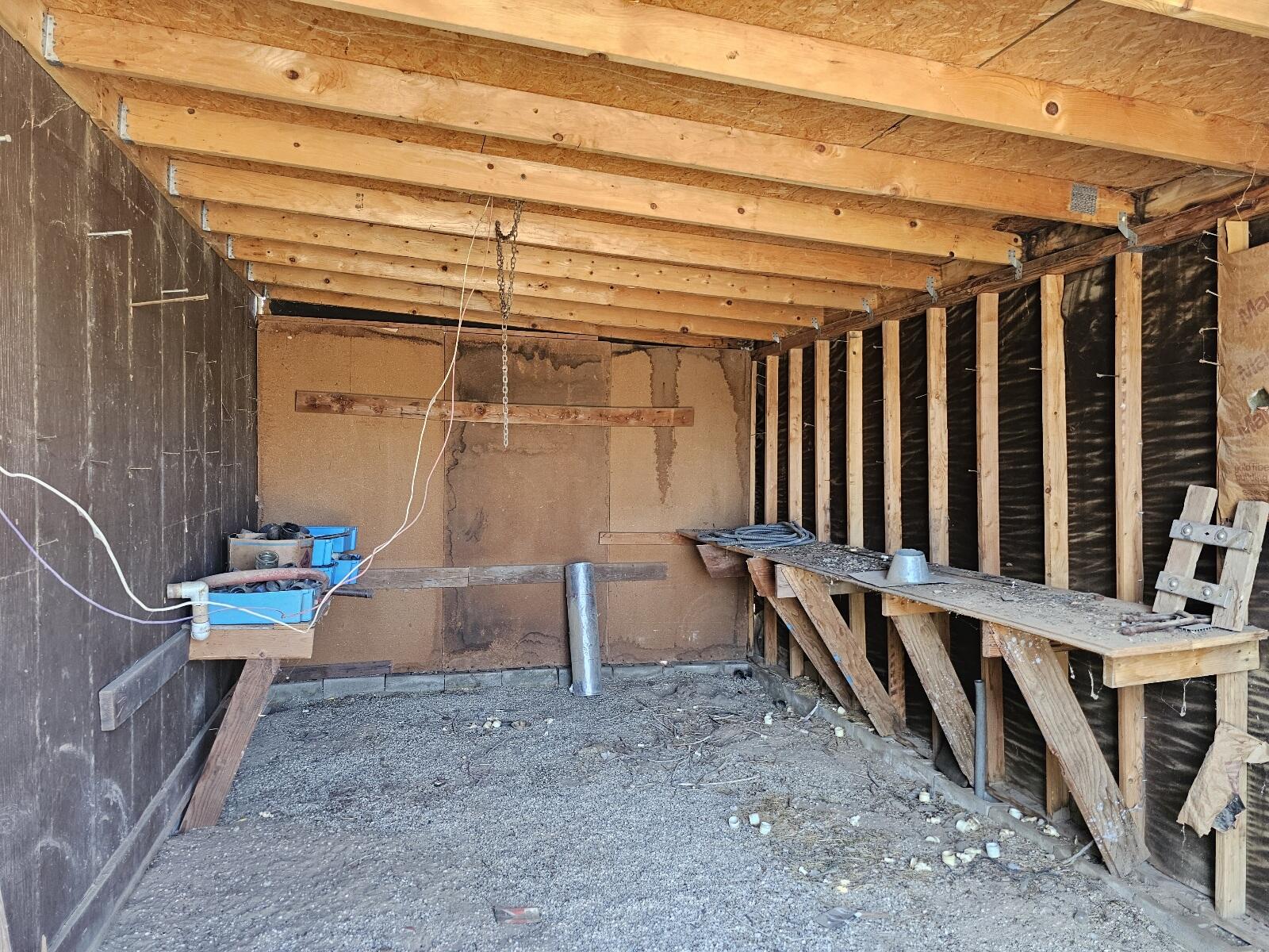 Gaskell Road Rosamond, CA 93560 - Photo 24 of 50 a view of wooden house with chairs and table