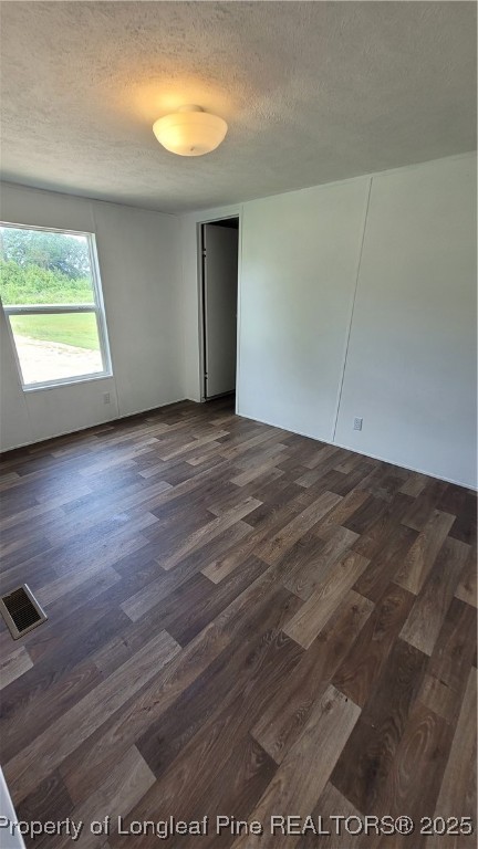 1235 Martin Road St. Pauls, NC 28384 - Photo 17 of 28 a view of an empty room with wooden floor and a window