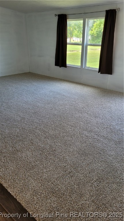1235 Martin Road St. Pauls, NC 28384 - Photo 2 of 28 a view of an empty room with a fireplace