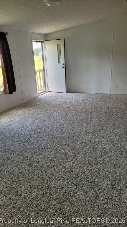 1235 Martin Road St. Pauls, NC 28384 - Photo 3 of 28 a view of a room with window and wooden floor