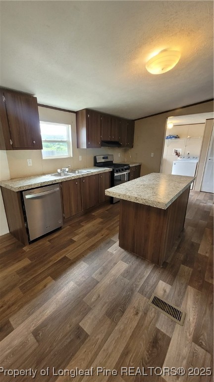 1235 Martin Road St. Pauls, NC 28384 - Photo 9 of 28 a kitchen with stainless steel appliances granite countertop a sink and a stove