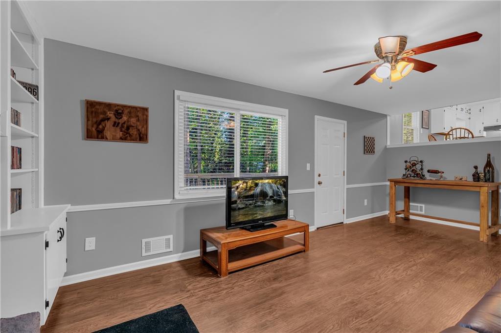 4907 Habersham Ridge Southwest Lilburn, GA 30047 - Photo 29 of 76 a bedroom with furniture and a window