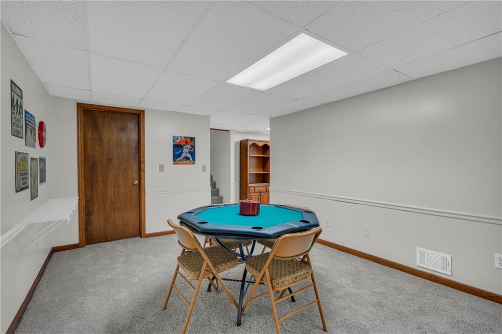 4907 Habersham Ridge Southwest Lilburn, GA 30047 - Photo 54 of 76 a workspace with furniture and a table