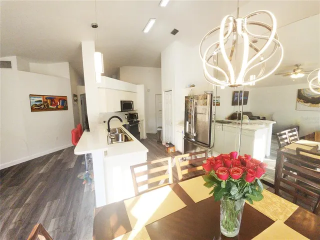 a view of a kitchen with furniture and a kitchen