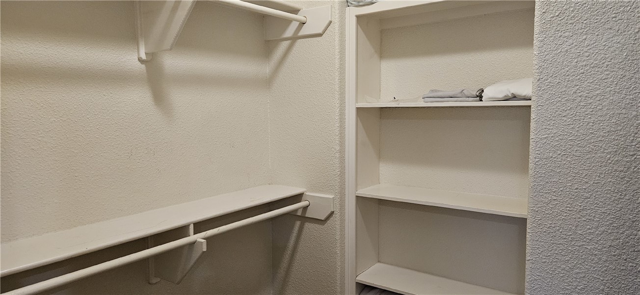 14334 Cruiser Street, Unit 202A Corpus Christi, TX 78418 - Photo 21 of 38 a close view of closet