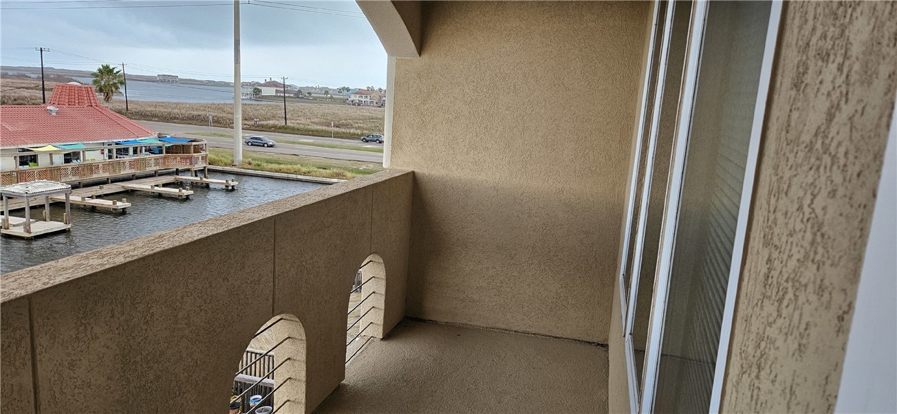14334 Cruiser Street, Unit 202A Corpus Christi, TX 78418 - Photo 22 of 38 a view of a livingroom with furniture and window