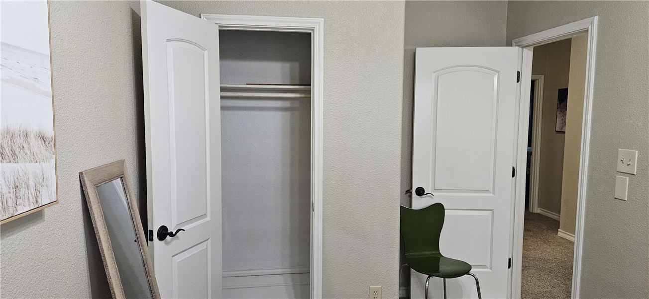 14334 Cruiser Street, Unit 202A Corpus Christi, TX 78418 - Photo 23 of 38 a view of a closet