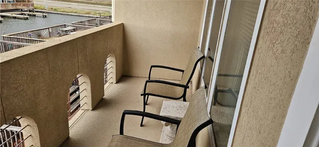 a view of staircase with a rug