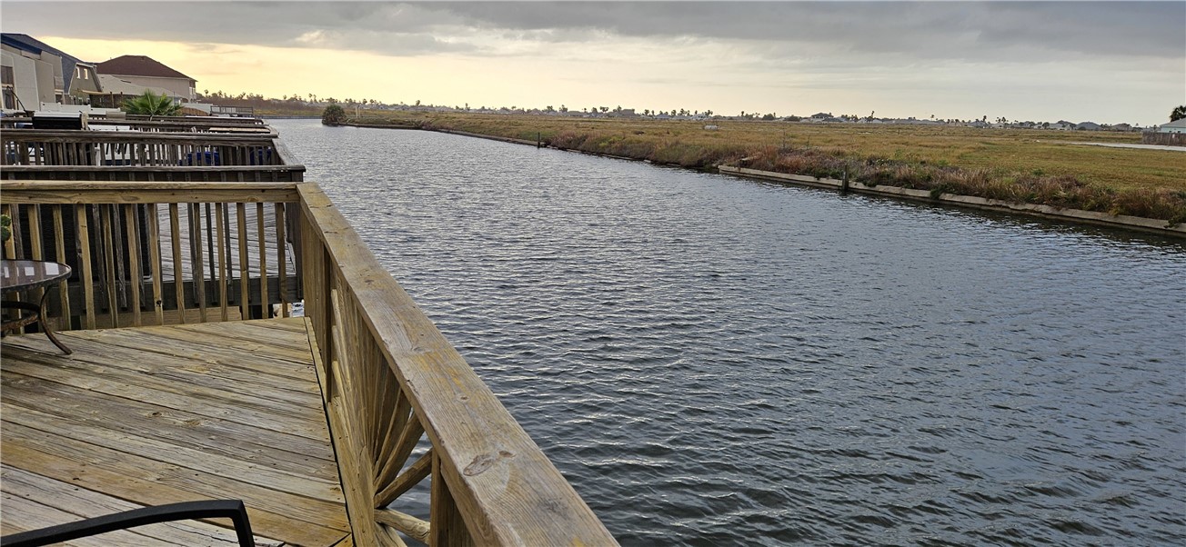 14334 Cruiser Street, Unit 202A Corpus Christi, TX 78418 - Photo 36 of 38 a view of terrace with seating space and lake view