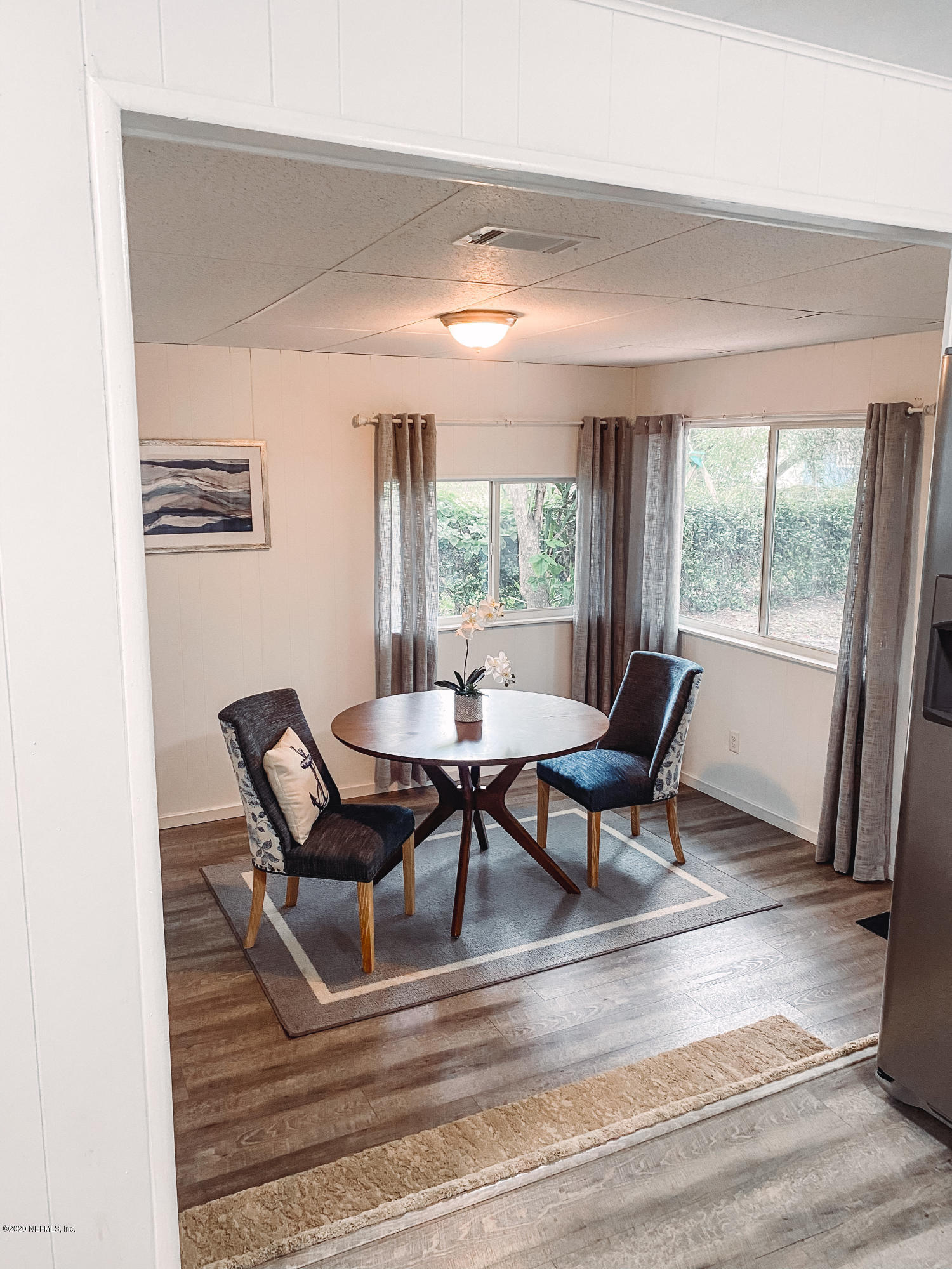 920 Palermo Road St. Augustine, FL 32086 - Photo 7 of 15 a dining room with furniture and wooden floor