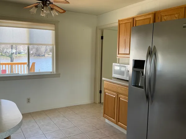 a view of kitchen island with furniture and wooden floor