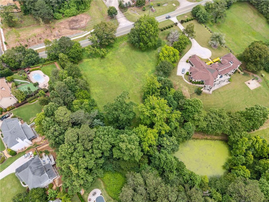 0 Cox Road Roswell, GA 30075 - Photo 9 of 11 an aerial view of residential house with outdoor space and swimming pool