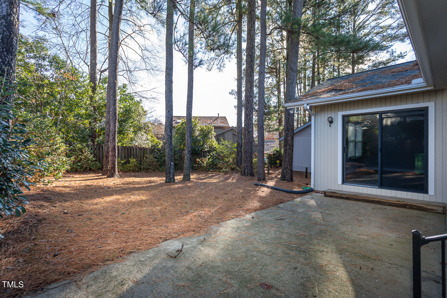 3008 Rue Sans Famille Raleigh, NC 27607 - Photo 17 of 21 a view of a house with backyard and trees