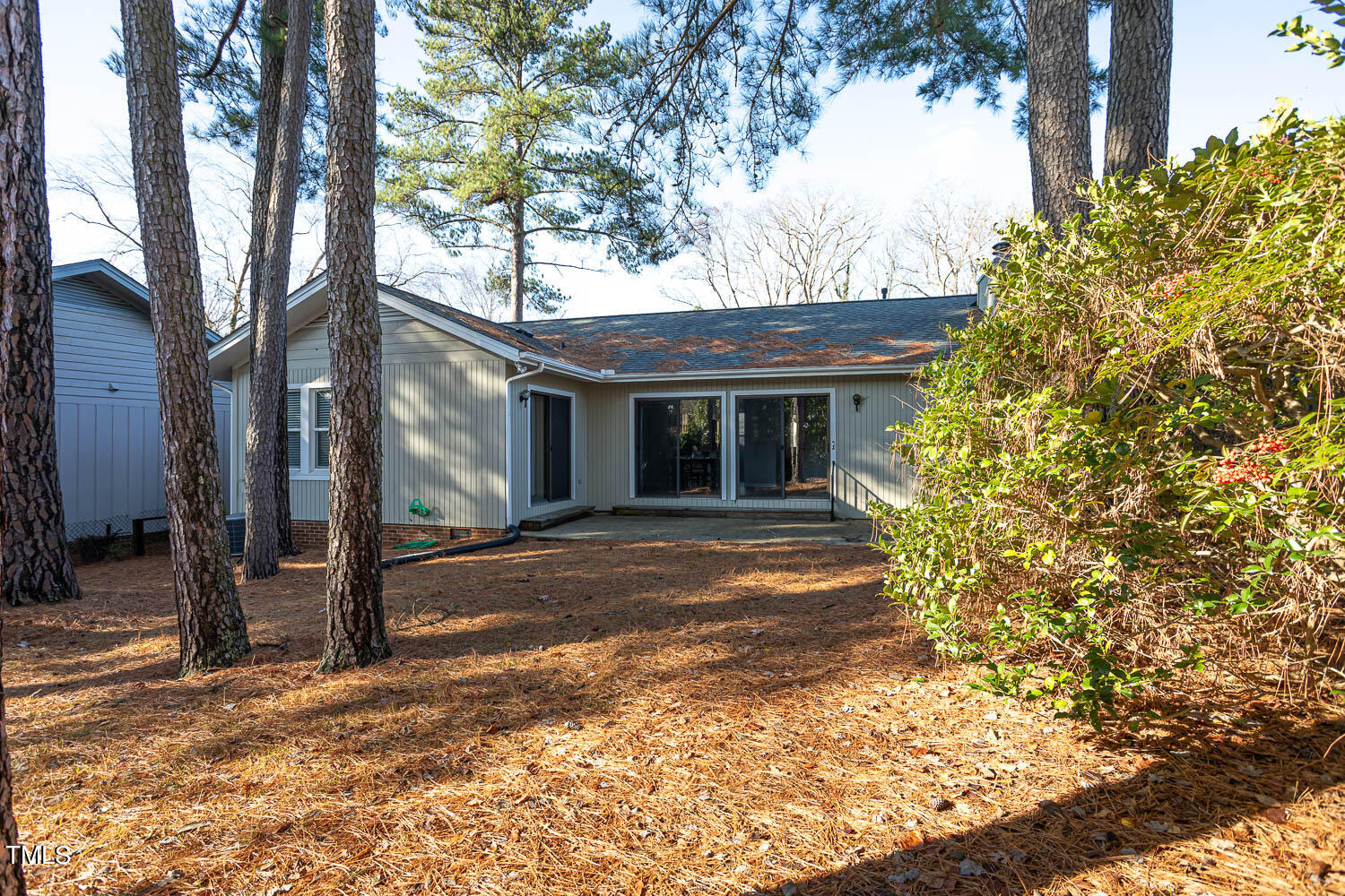 3008 Rue Sans Famille Raleigh, NC 27607 - Photo 18 of 21 a view of a house with a tree in front of it