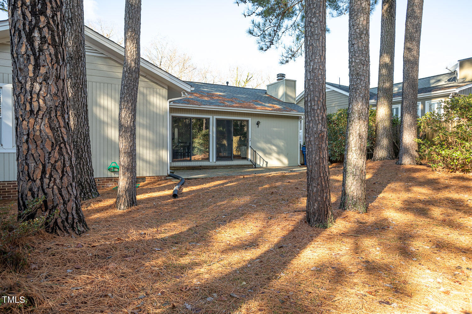 3008 Rue Sans Famille Raleigh, NC 27607 - Photo 19 of 21 a view of a house with backyard and sitting area