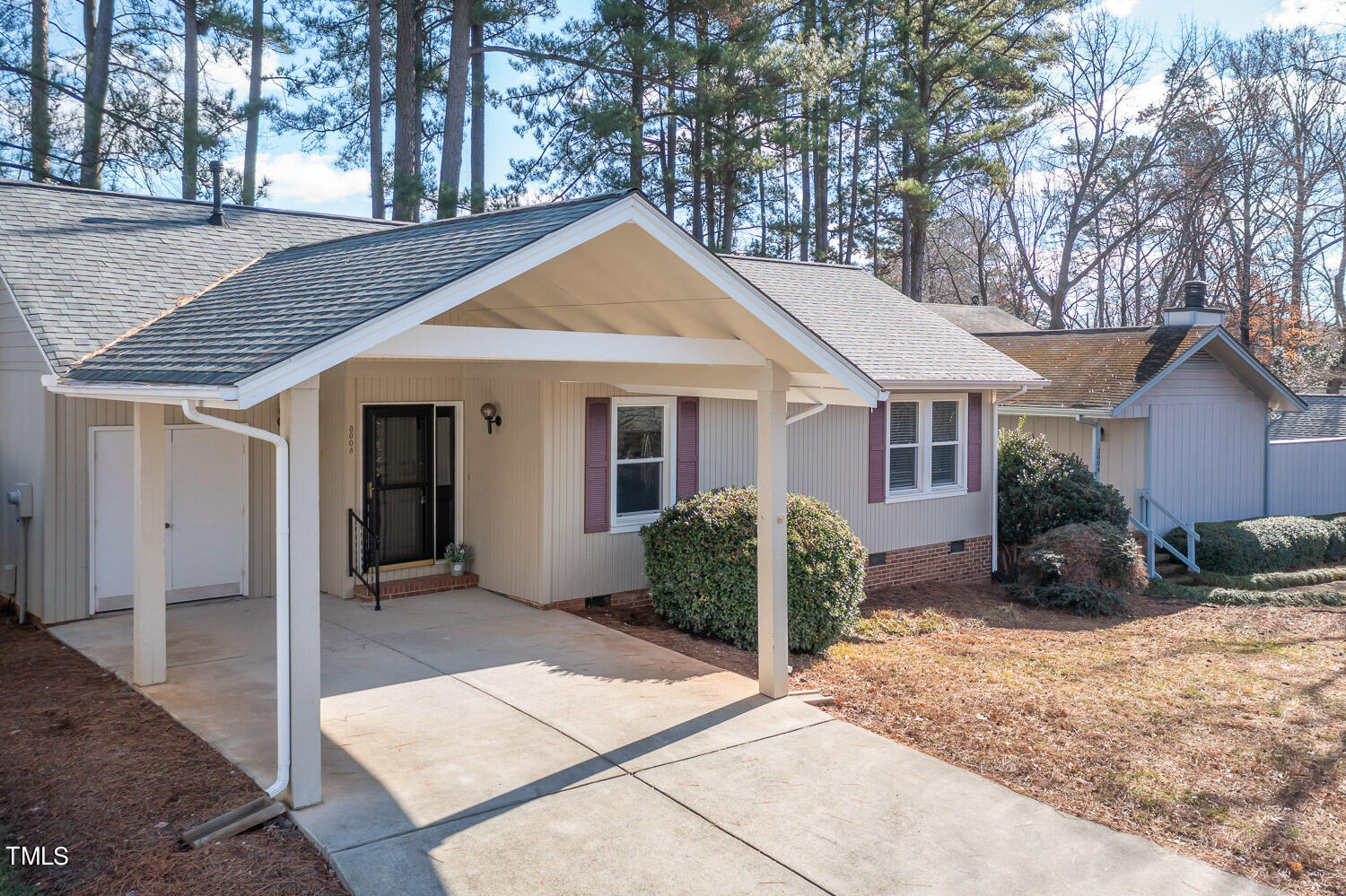 3008 Rue Sans Famille Raleigh, NC 27607 - Photo 20 of 21 a front view of a house with garden
