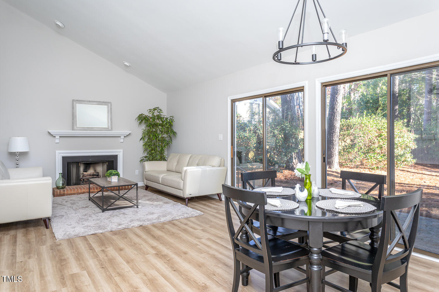 3008 Rue Sans Famille Raleigh, NC 27607 - Photo 3 of 21 a view of a dining room with furniture window and outside view