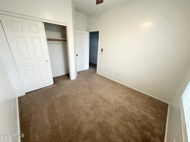 an empty room with closet