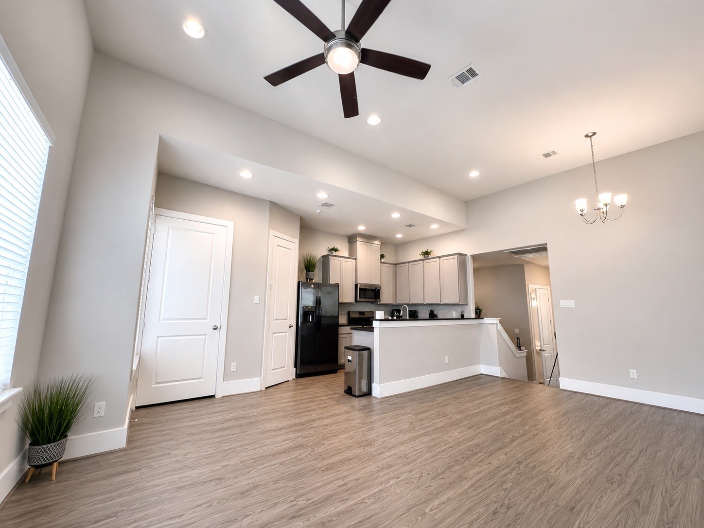 731 Janisch Road Houston, TX 77018 - Photo 15 of 19 Open concept Living/Dining & Kitchen upstairs with beautiful natural light and plenty of space to entertain. All TV mounts will stay with the home.