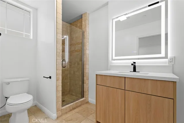 a view of a street with a building in the background