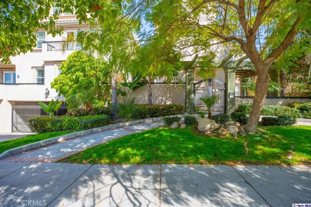 a view of a house with a street