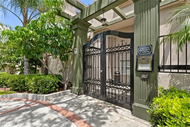 a view of a house with a tree