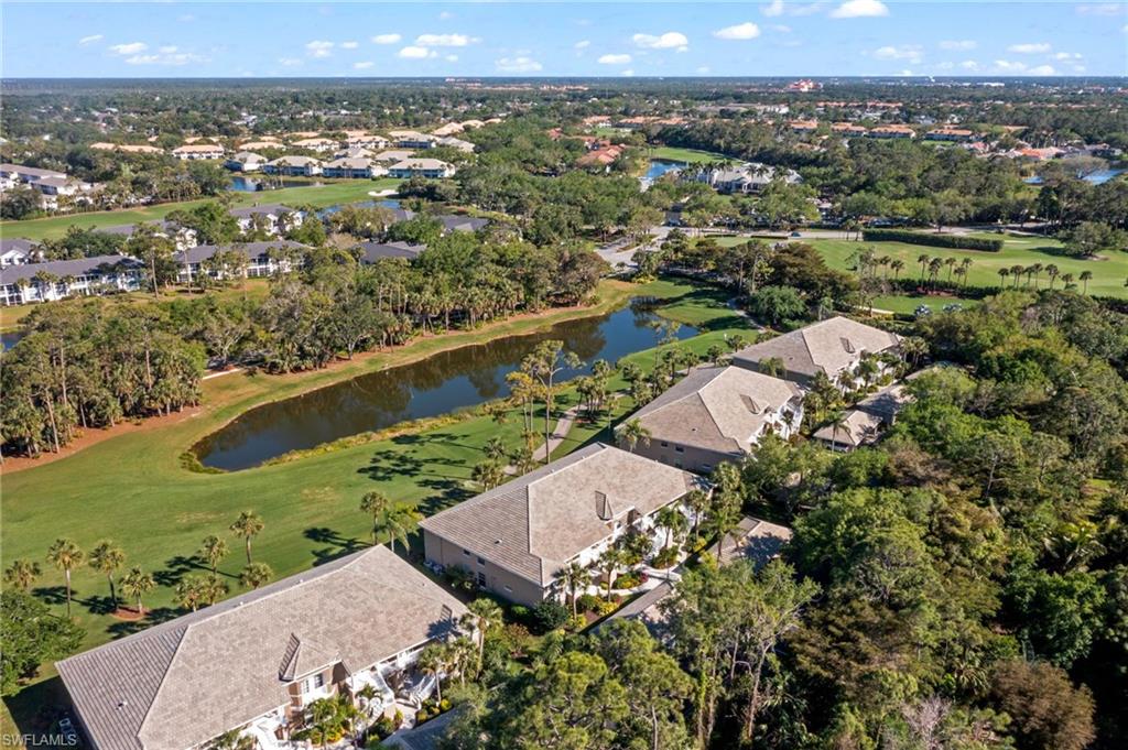 1940 Willow Bend Circle, Unit 103 Naples, FL 34109 - Photo 1 of 3 an aerial view of a residential houses with outdoor space