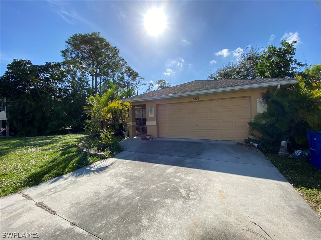 8438 Wren Road Fort Myers, FL 33967 - Photo 3 of 20 a view of a garage