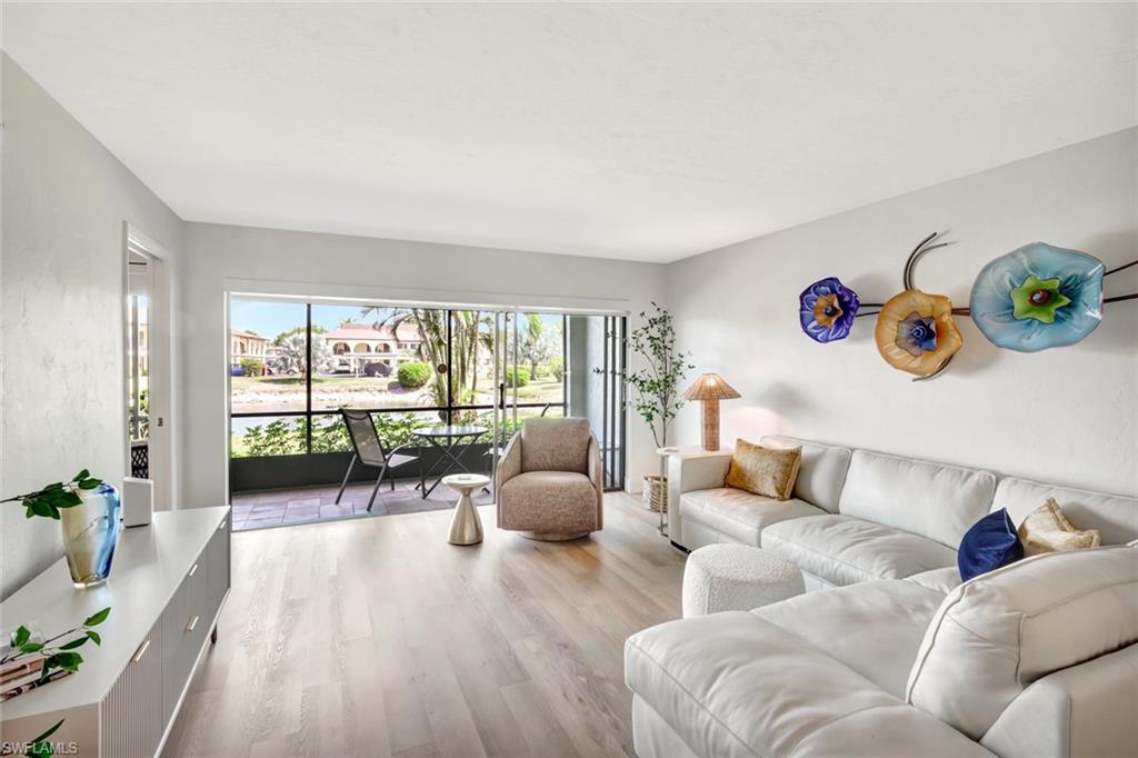 5590 Rattlesnake Hammock Road, Unit M104 Naples, FL 34113 - Photo 2 of 34