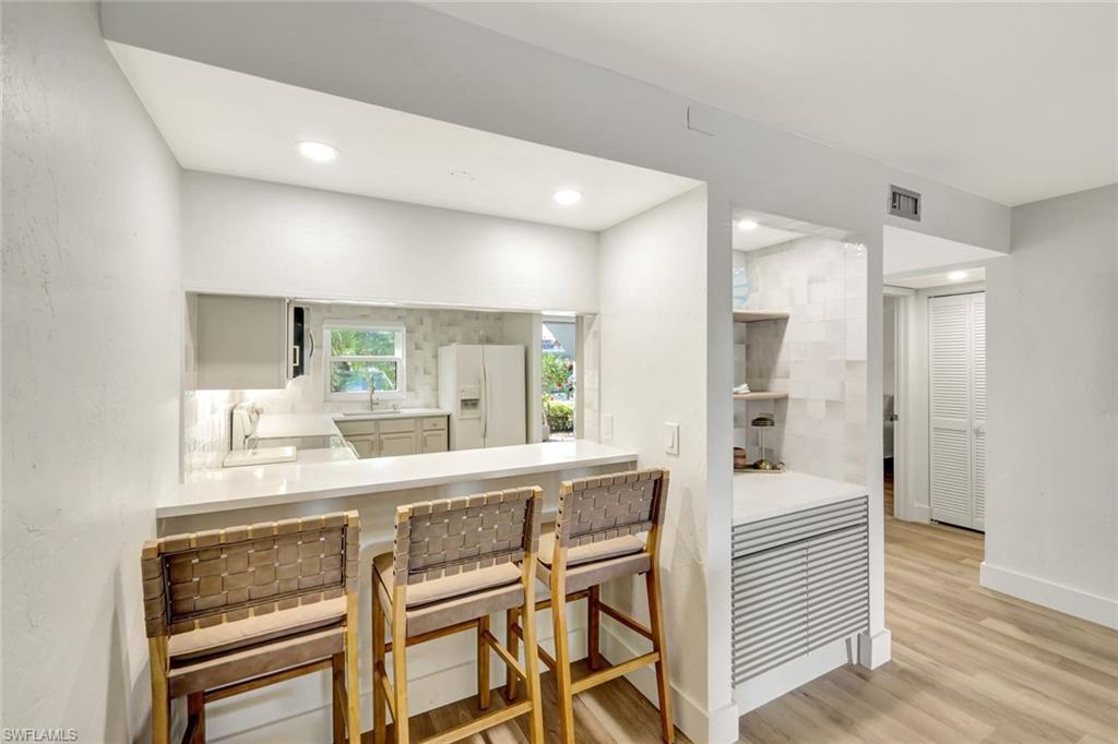 5590 Rattlesnake Hammock Road, Unit M104 Naples, FL 34113 - Photo 6 of 34