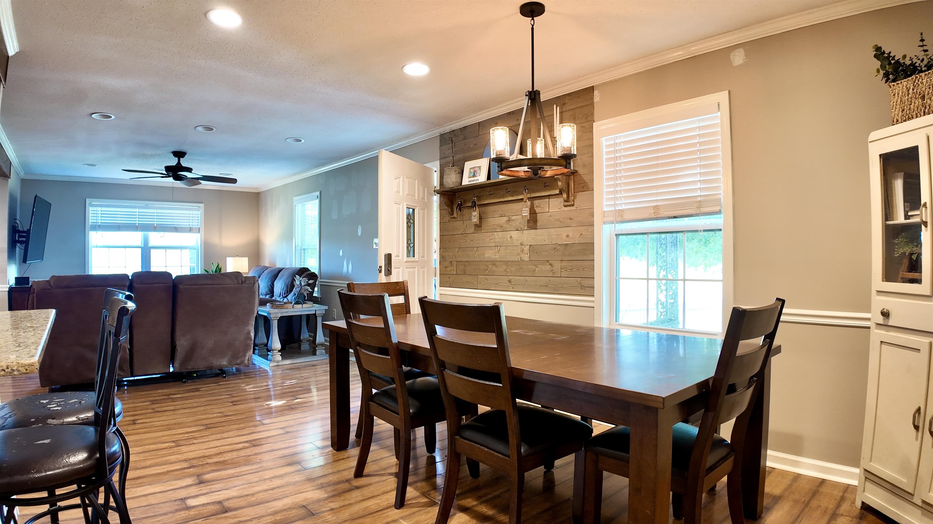 3312 Old Memphis Road Covington, TN 38019 - Photo 19 of 32 Dining space featuring ornamental molding, wood-type flooring, and plenty of natural light