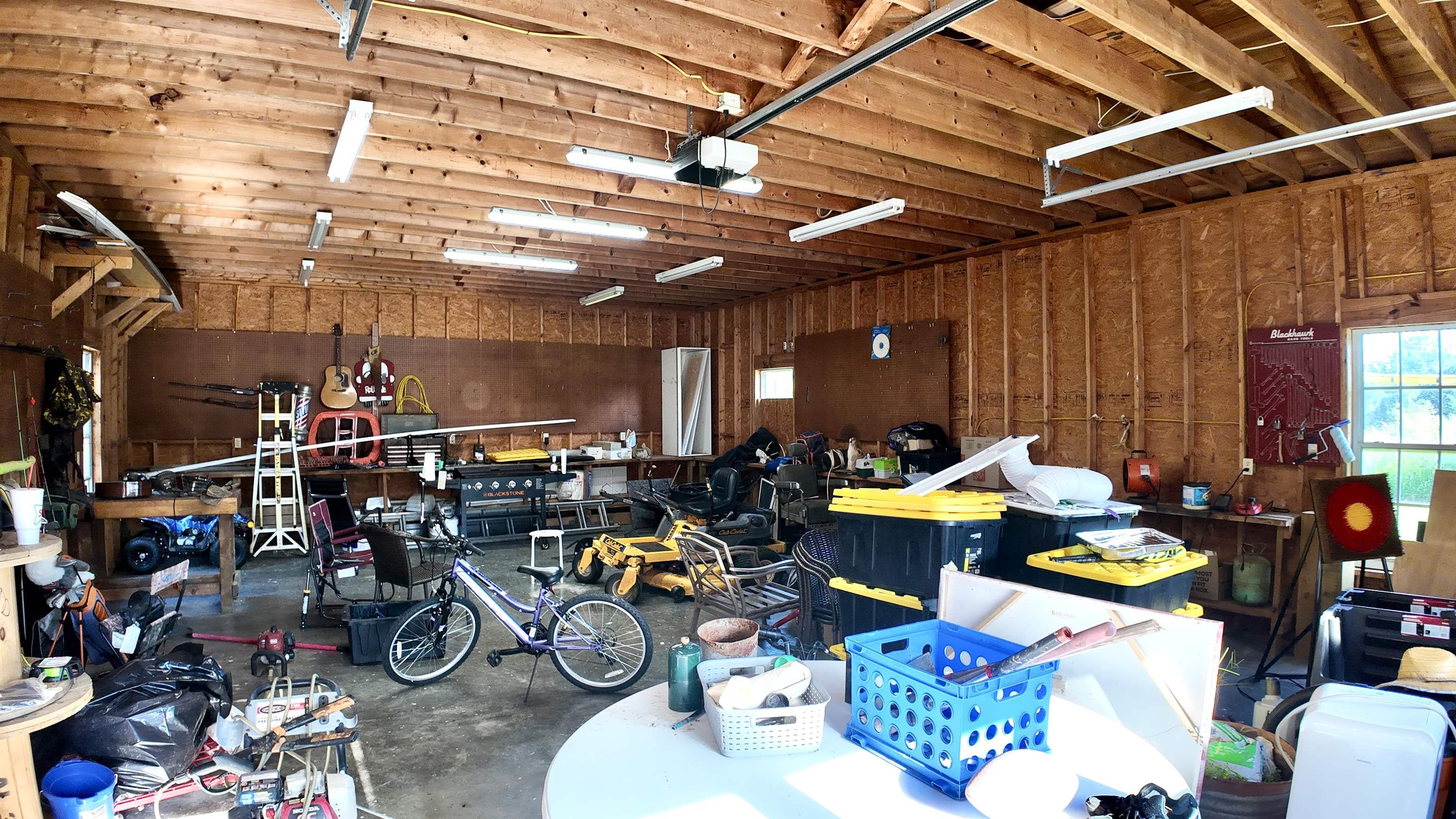 3312 Old Memphis Road Covington, TN 38019 - Photo 31 of 32 Garage featuring a garage door opener