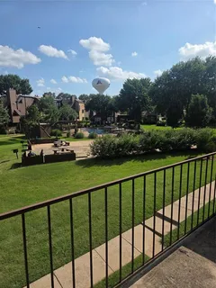 a view of street from balcony