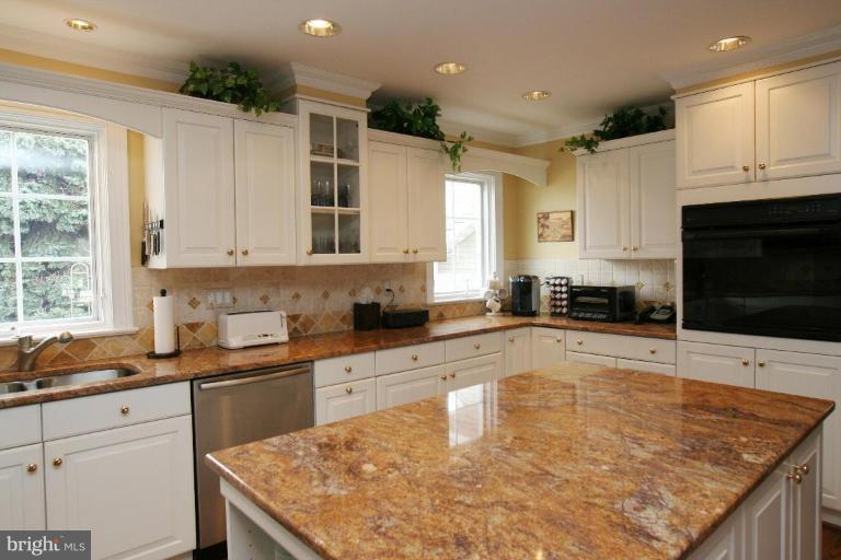 5329 Brooks Woods Road Lothian, MD 20711 - Photo 15 of 30 16 x 9 Gourmet Kitchen with wood floors