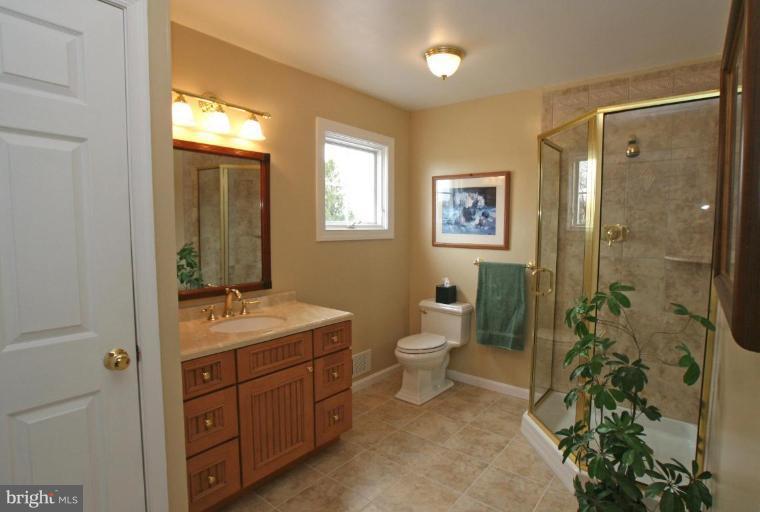 5329 Brooks Woods Road Lothian, MD 20711 - Photo 21 of 30 Bath#2 is private to a bedroom upstairs