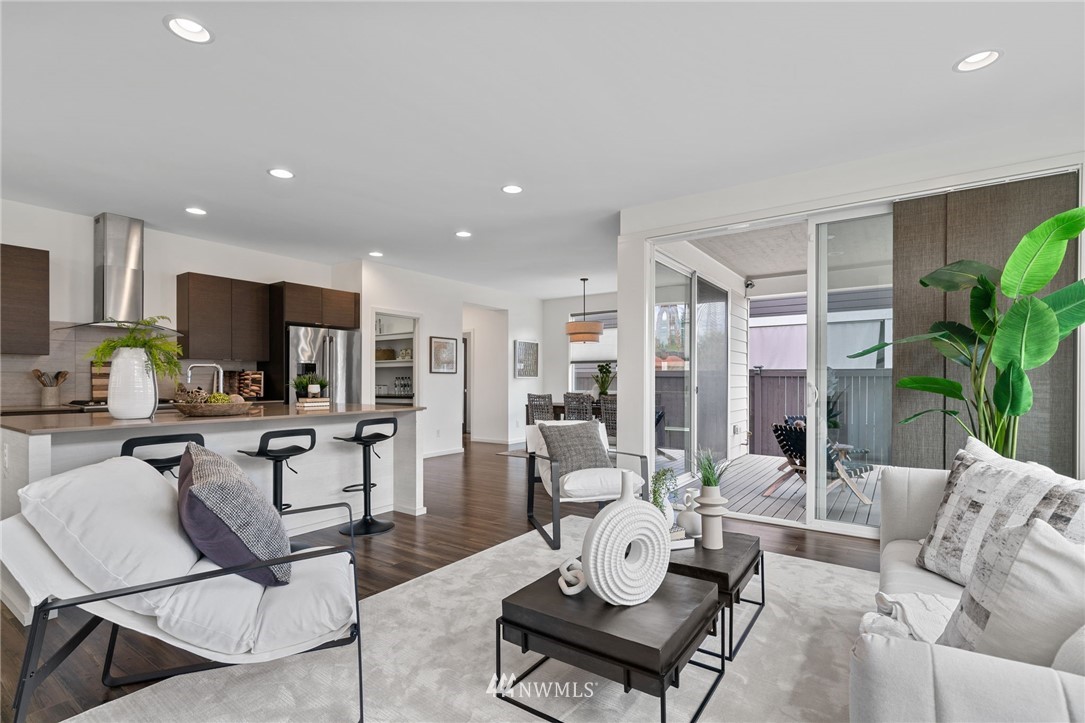 17223 40th Avenue Southeast Bothell, WA 98012 - Photo 20 of 37 a living room with furniture kitchen view and a large window
