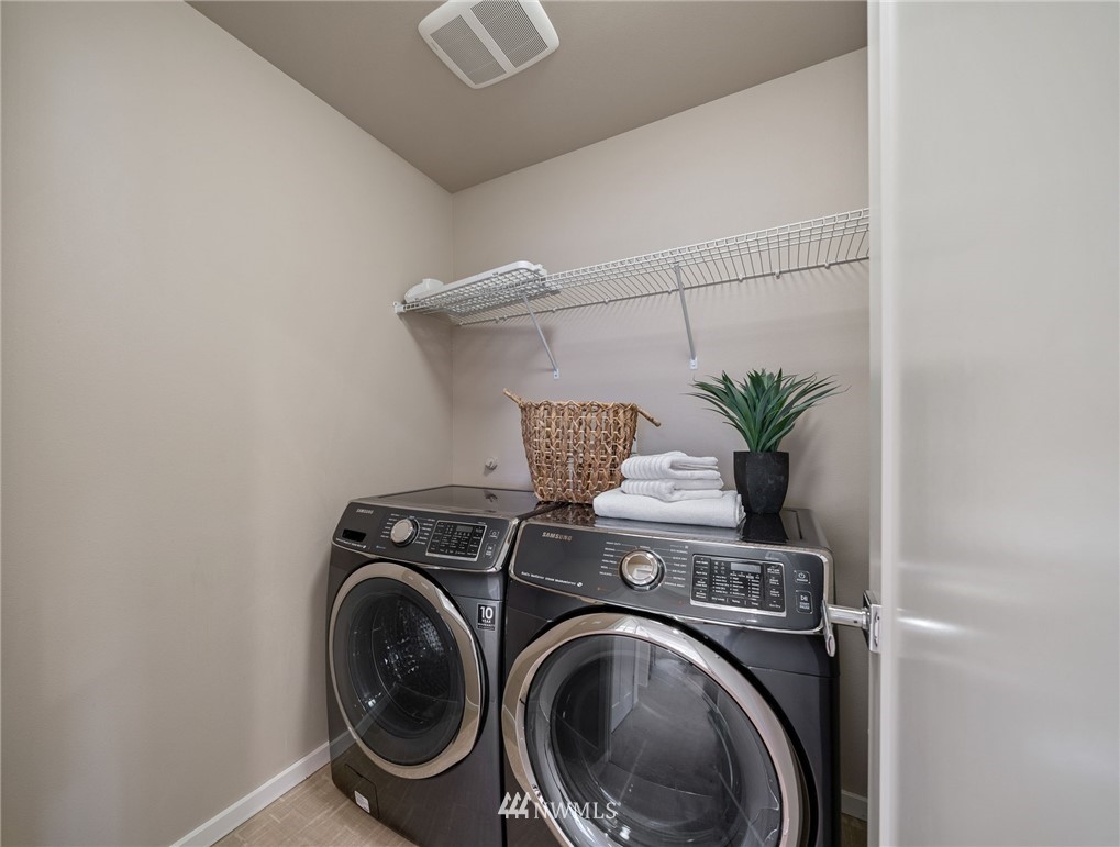 17223 40th Avenue Southeast Bothell, WA 98012 - Photo 24 of 37 a utility room with dryer and washer