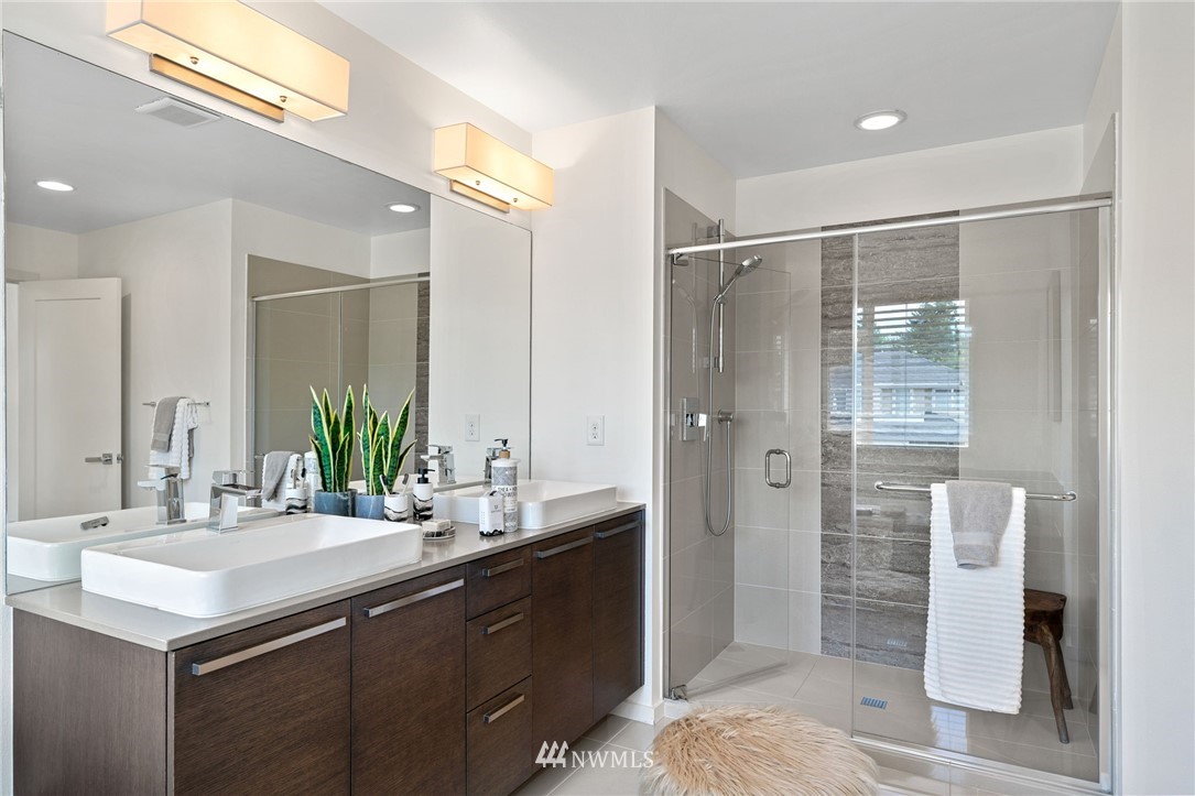 17223 40th Avenue Southeast Bothell, WA 98012 - Photo 30 of 37 a bathroom with a double vanity sink and mirror