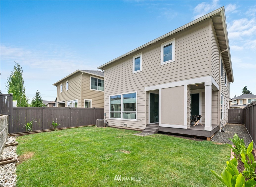 17223 40th Avenue Southeast Bothell, WA 98012 - Photo 36 of 37 front view of a house with a yard and fence