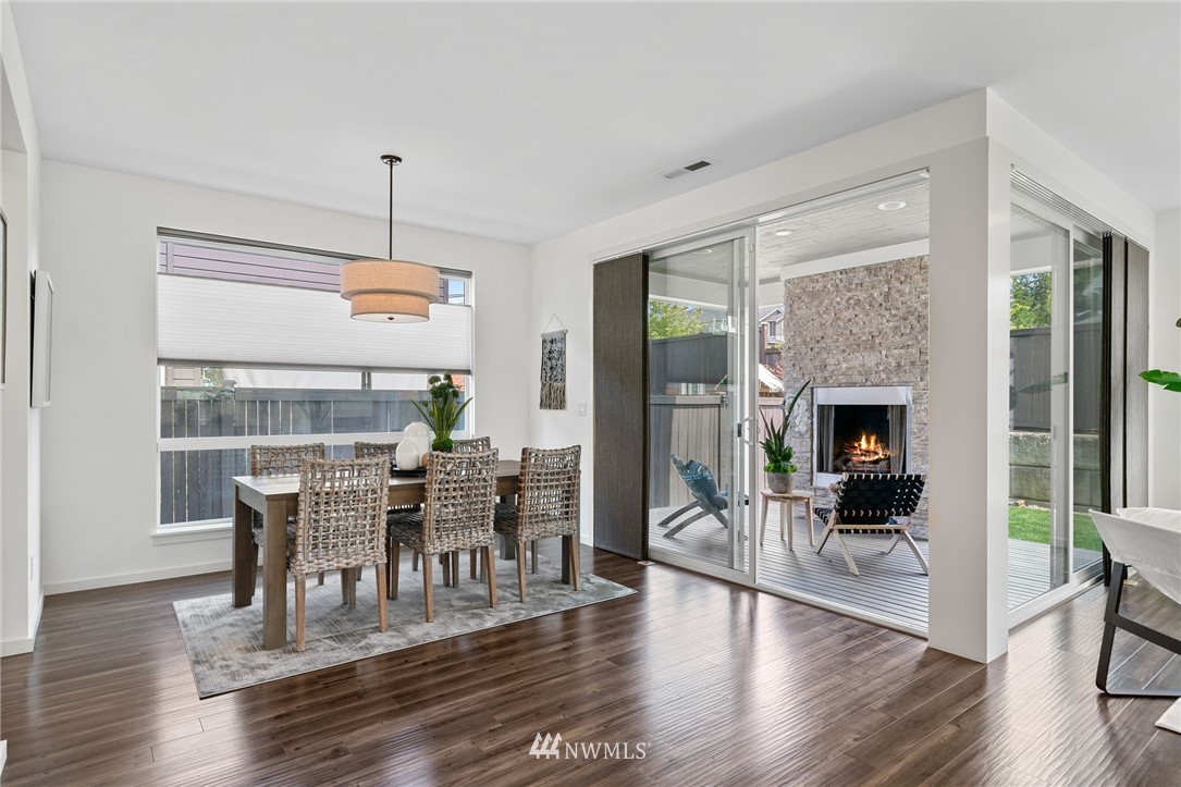 17223 40th Avenue Southeast Bothell, WA 98012 - Photo 8 of 37 a view of a dining room with furniture window and wooden floor