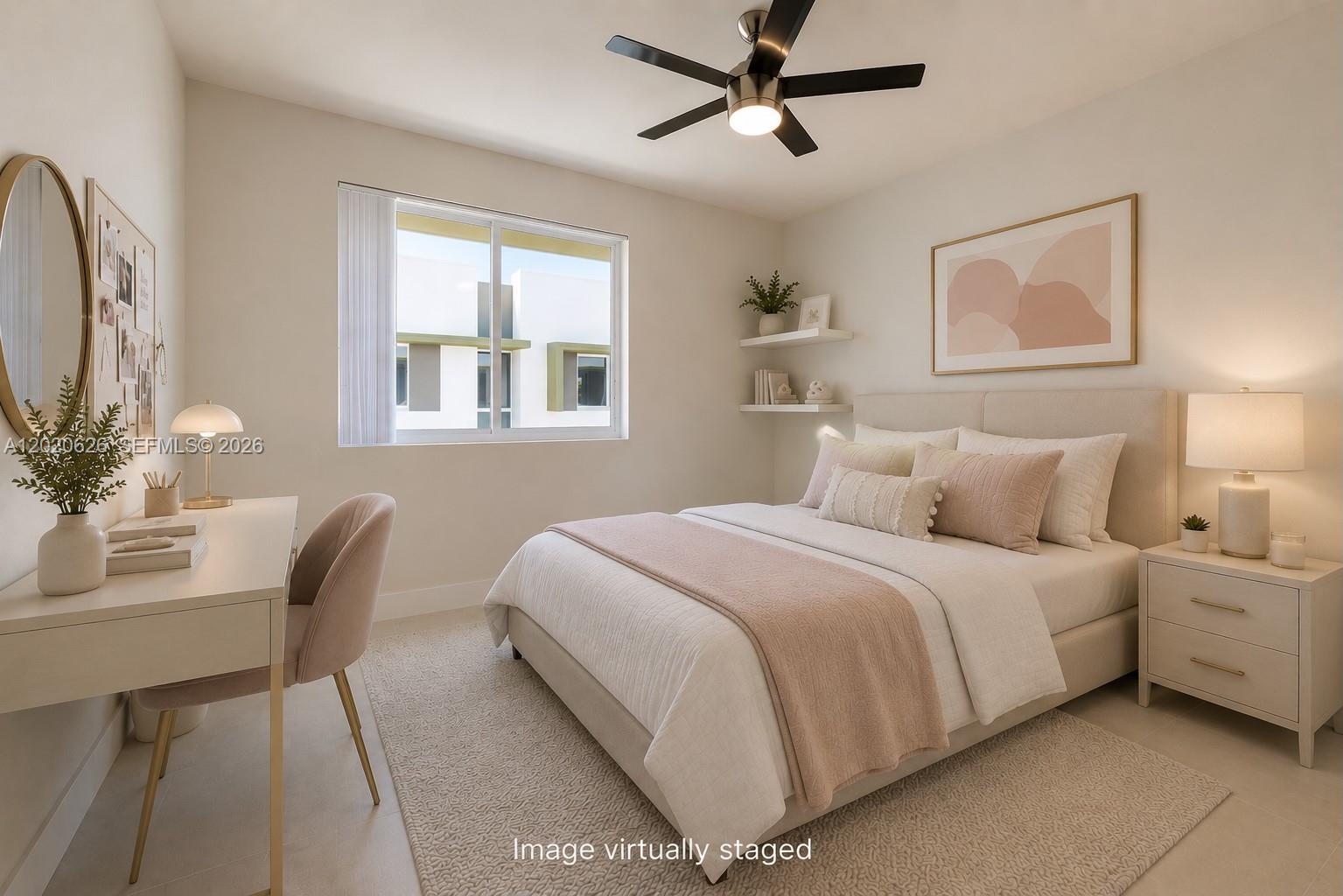 7701 Southwest 95th Terrace, Unit 1 Miami, FL 33156 - Photo 5 of 18 a bedroom with a bed and a table