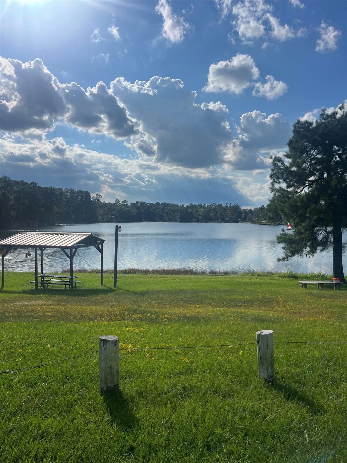 13181 Royal Springs Road Conroe, TX 77303 - Photo 3 of 10 a view of a golf course with a lake view