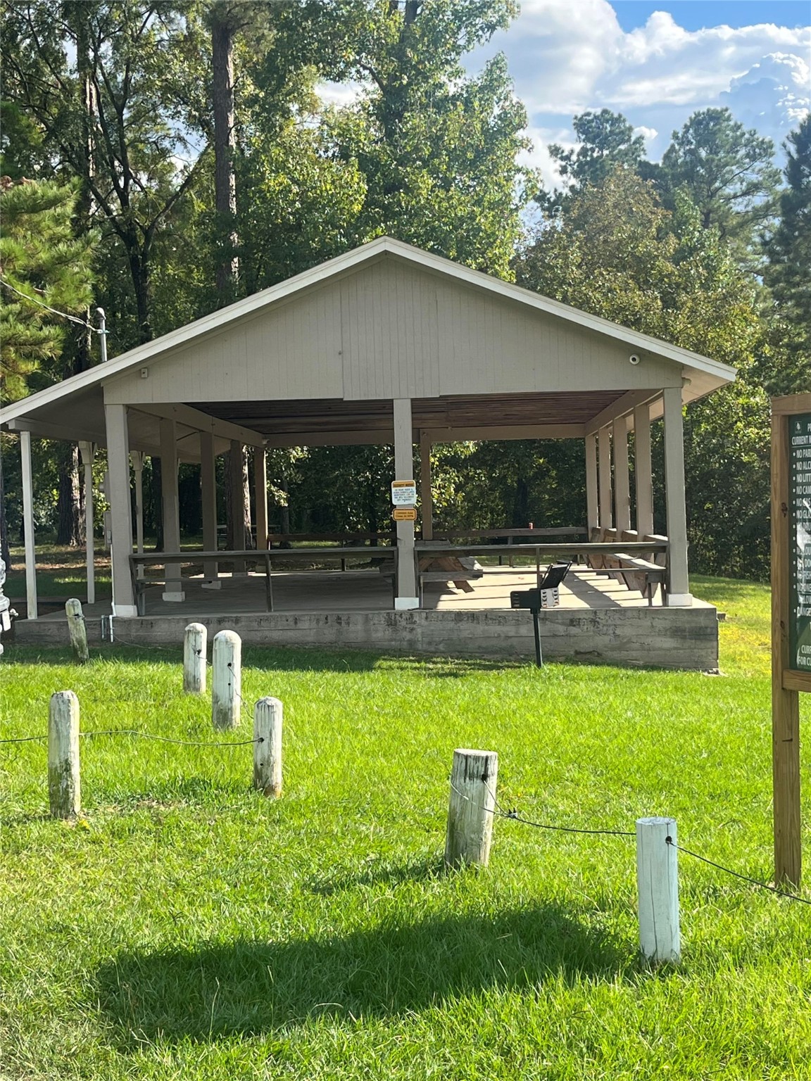 13181 Royal Springs Road Conroe, TX 77303 - Photo 4 of 10 a house view with swimming pool and garden view