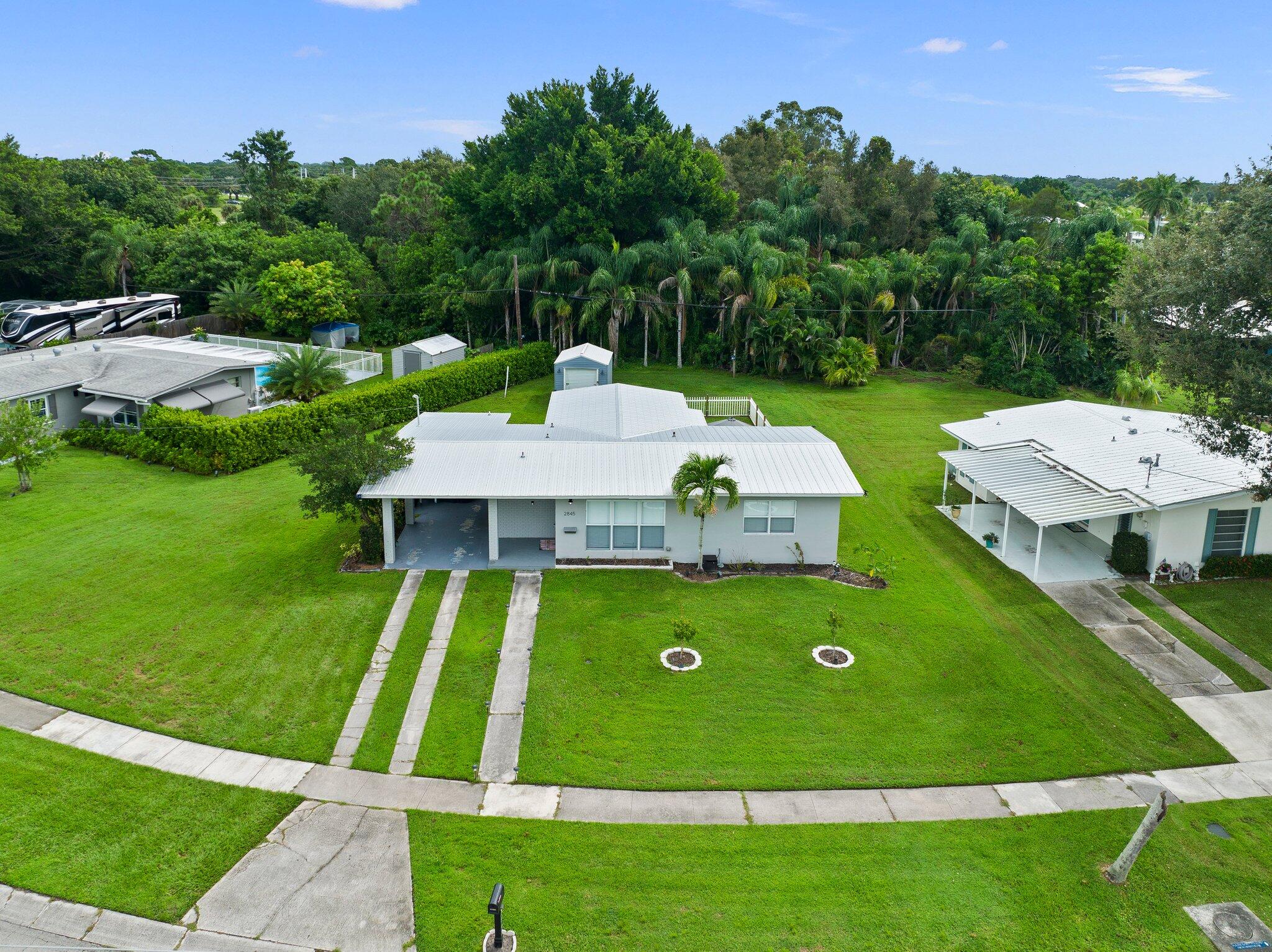 2845 Southeast Treasure Island Road Port St. Lucie, FL 34952 - Photo 4 of 53 4-web-or-mls-DJI_0008