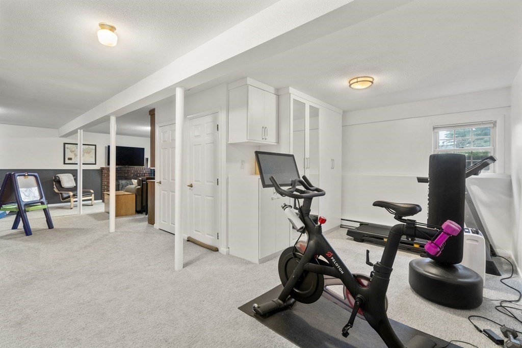 99 Graymore Road Waltham, MA 02451 - Photo 21 of 38 a view of a room with gym equipment