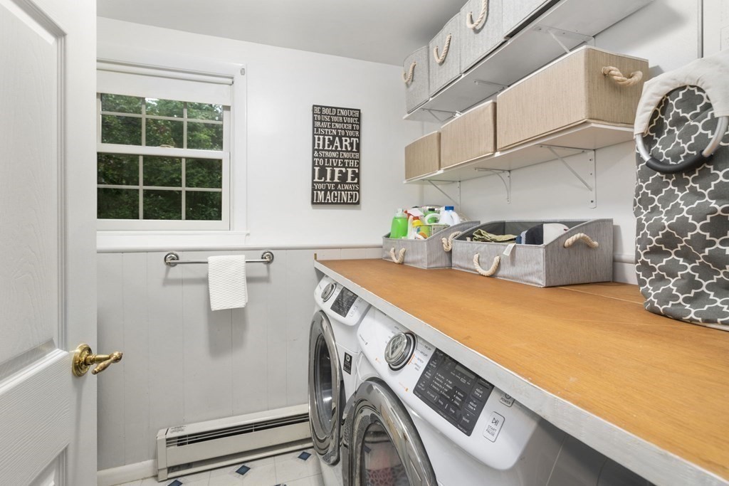99 Graymore Road Waltham, MA 02451 - Photo 24 of 38 a utility room with dryer and washer