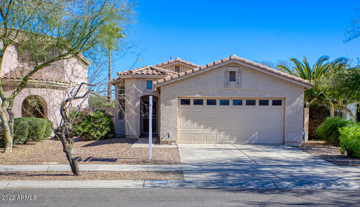 4333 South Rim Court Gilbert, AZ 85297 - Photo 1 of 20 a front view of a house with a yard