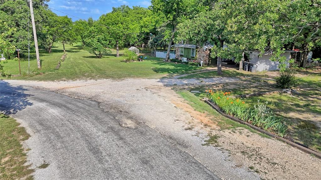 140 Elm Road Nocona, TX 76255 - Photo 26 of 26 a view of a park with large trees