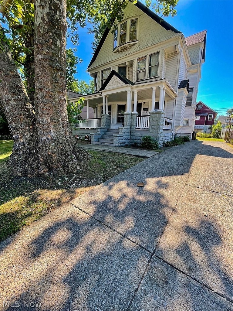 554 Eddy Road Cleveland, OH 44108 - Photo 5 of 32 Victorian home featuring a porch and driveway