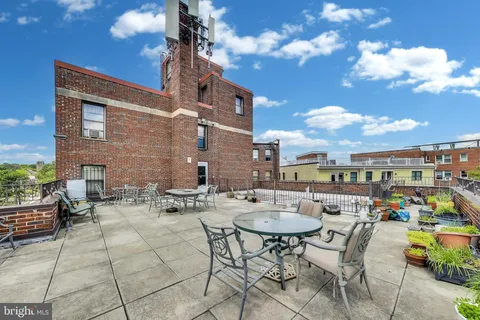 a view of a dinning tables and chairs in the patio